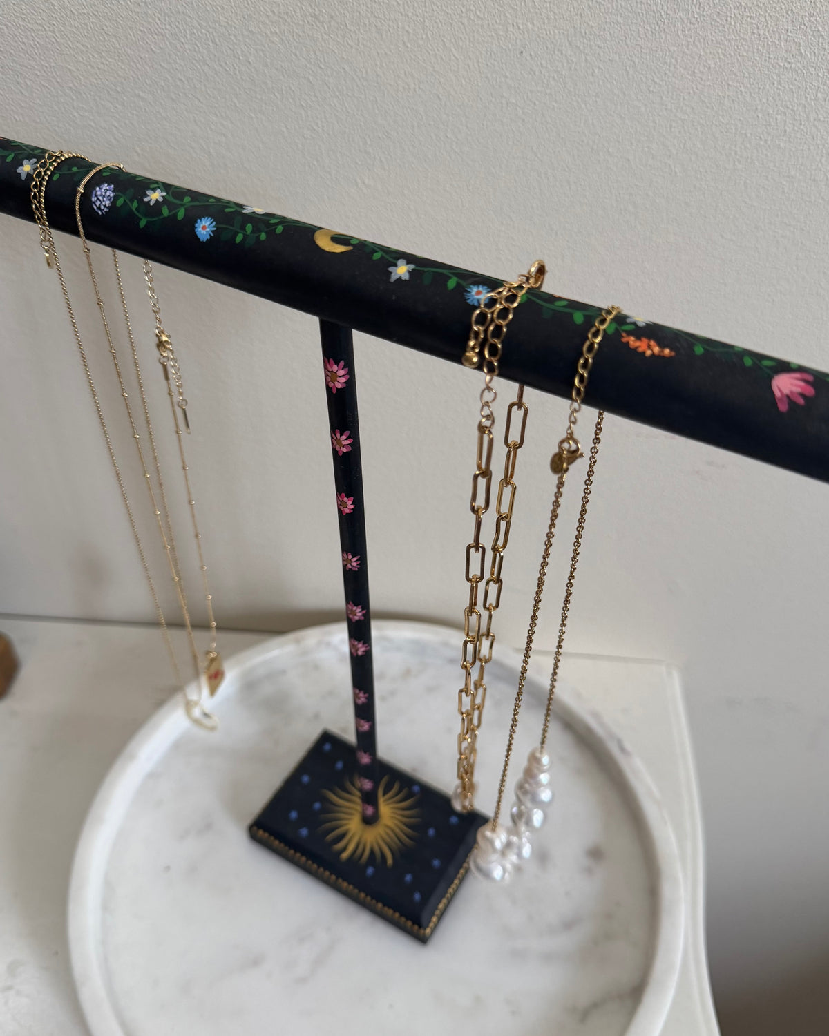 wooden jewelryholder with flower art painted and golden details for necklaces and bracelets