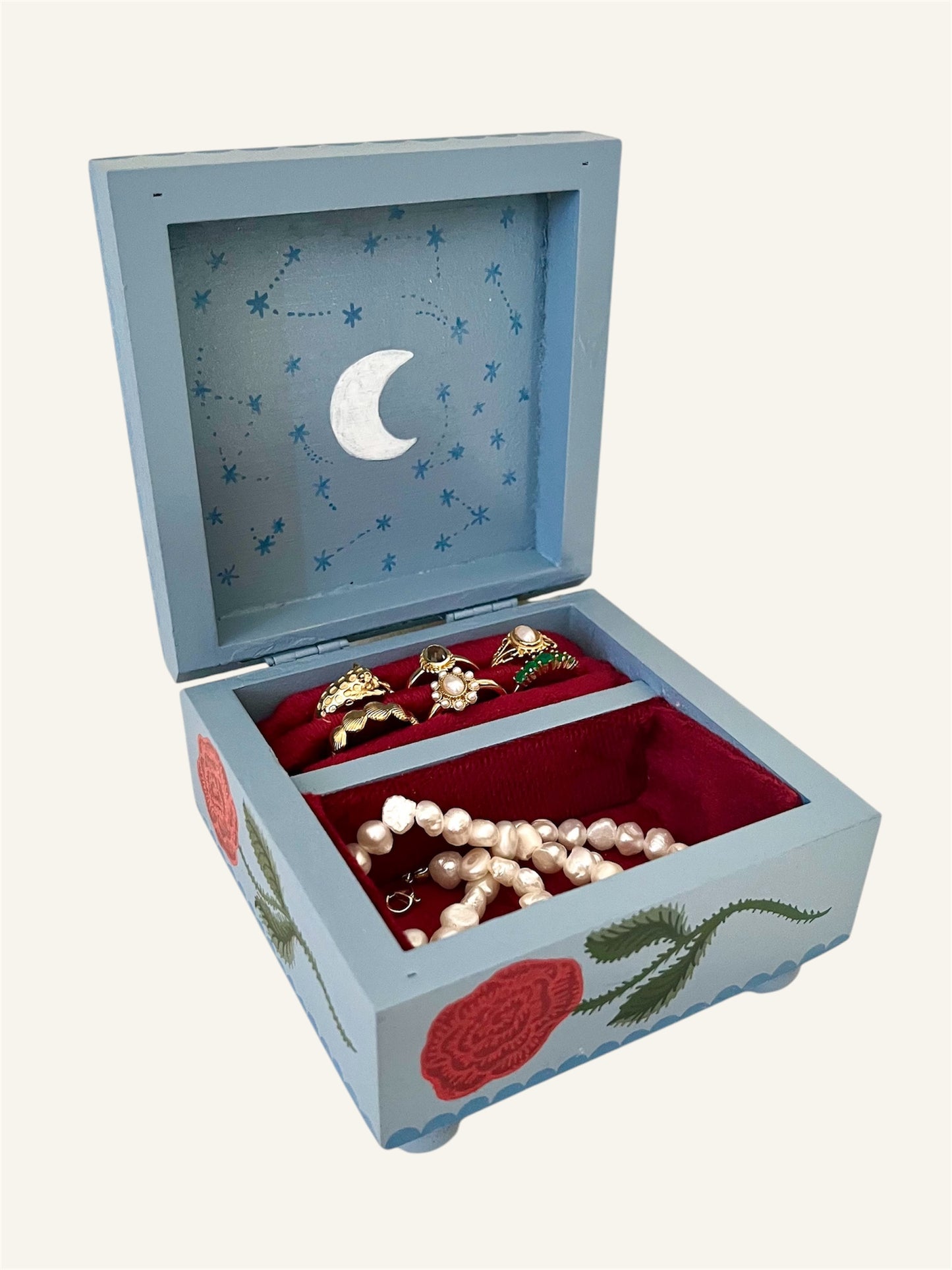 binnenkant van luxe sieradenkist blauw met bloemen en vogel Roozen
