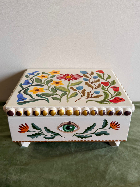 beige jewelrybox with colorful flowers and moon cyclus