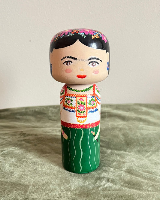 wooden kokeshi doll if icon artist Frida Kahlo interior item