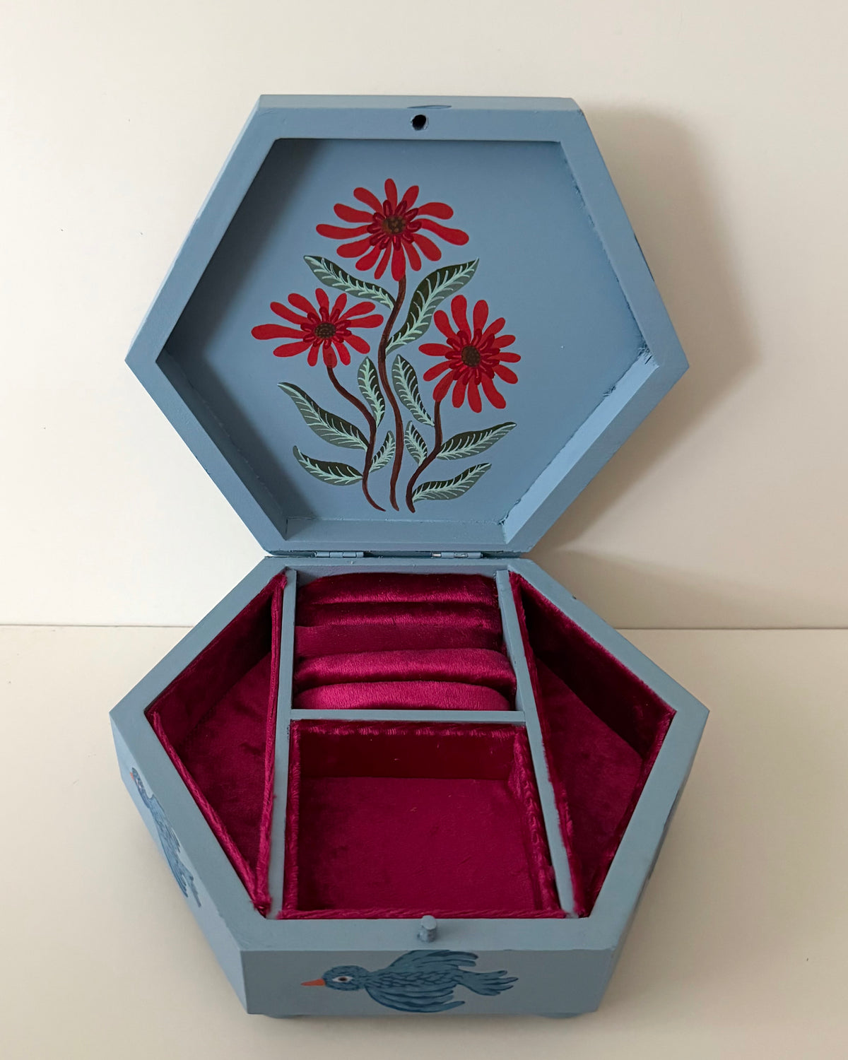 Blue jewelrybox with red velvet linning