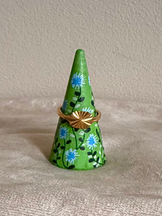 Green ringholder with blue flowers and vintage gold ring