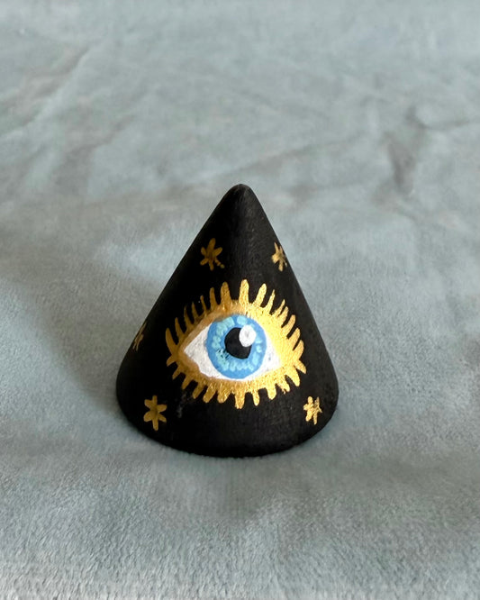 Ringkegel zwart met beschilderd blauw oog