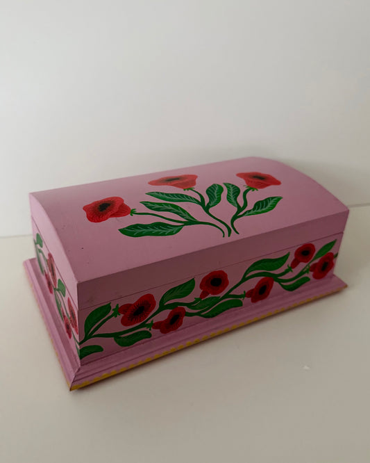 Pink vintage jewelrybox with red flowers 