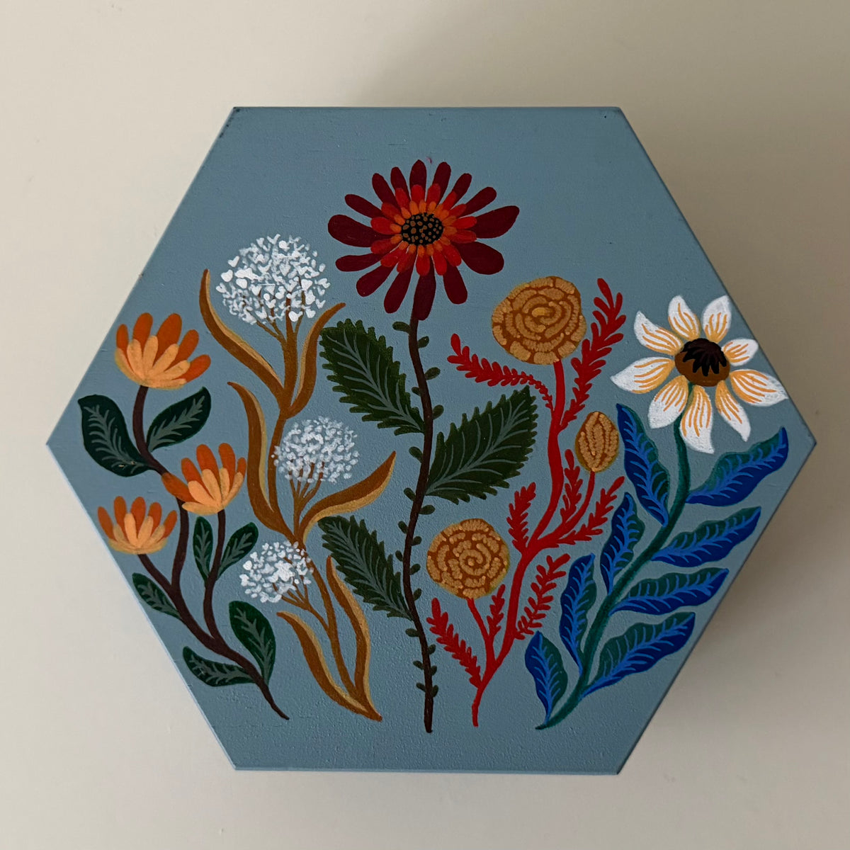 Blue jewelrybox with colorful flowers 