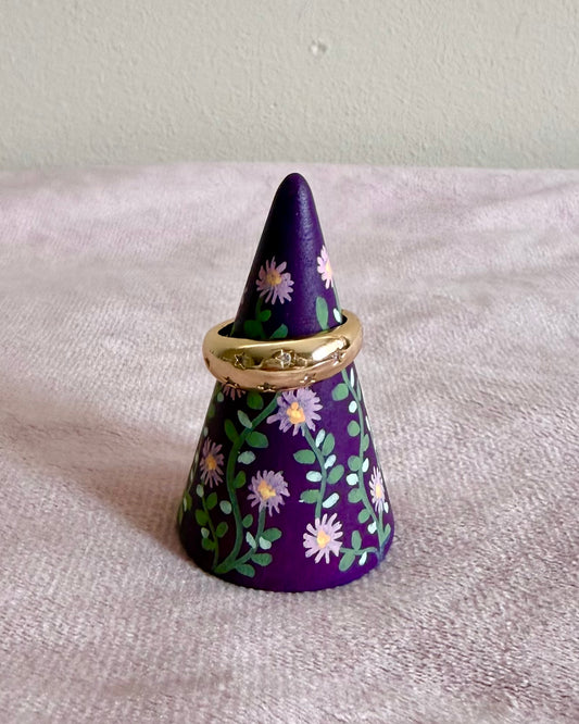 purple ringcone with lilac flowers and golden ring