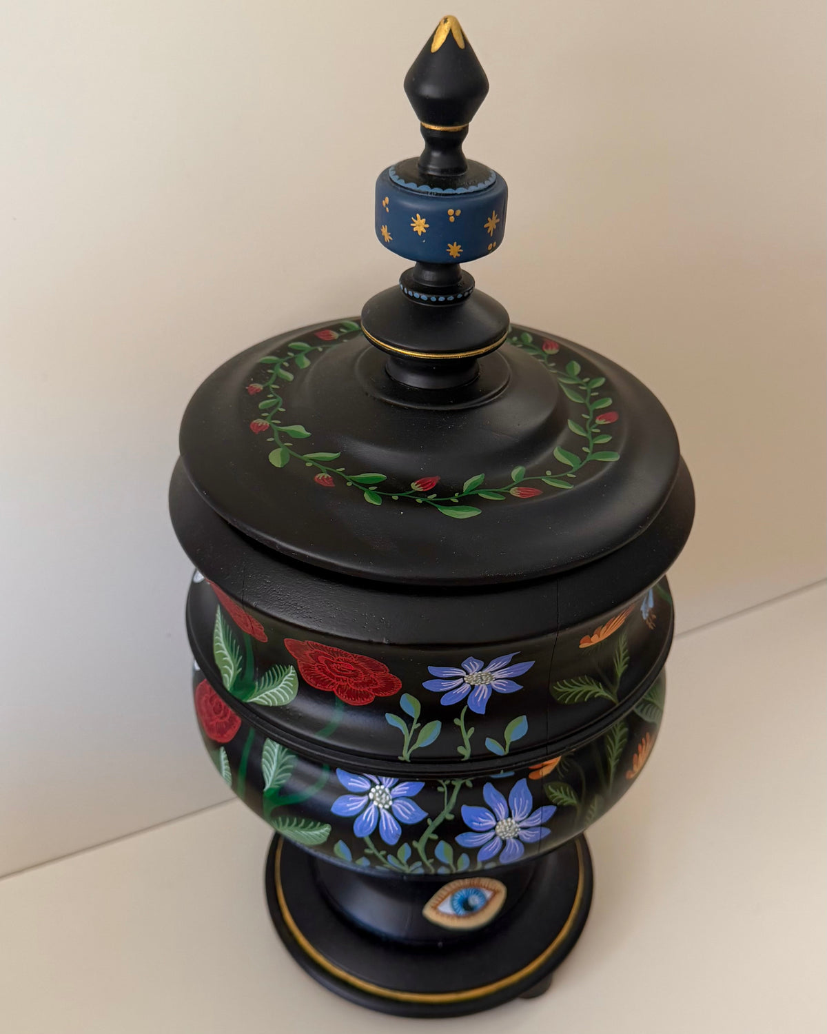 vintage jewerlybox with colorful flowers adn red velvet lining