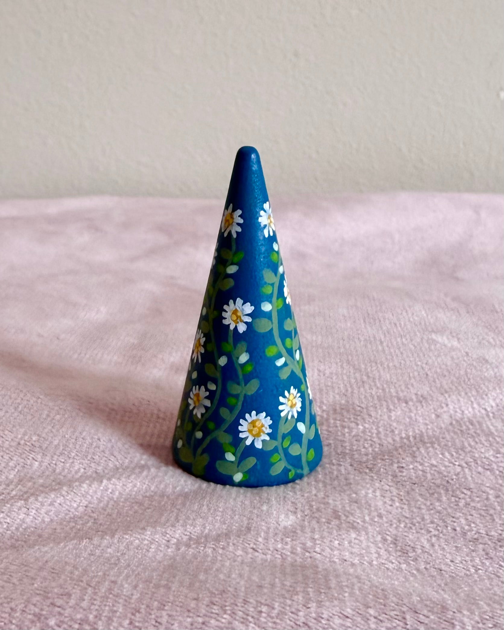 blue ringcone with white flowers